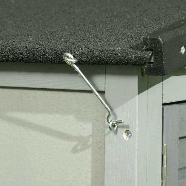 Metal support rod and latch at the rabbit hutch door frame