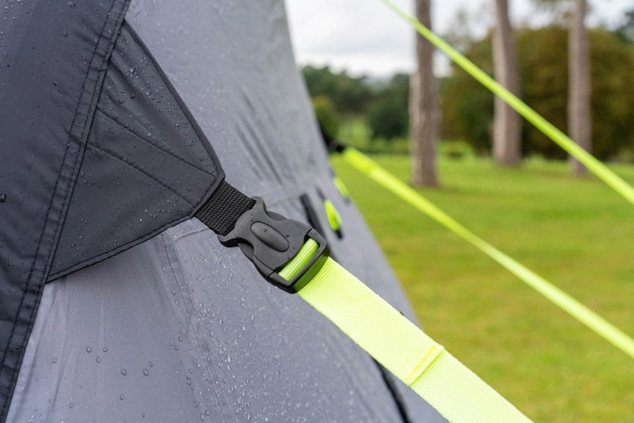 A closeup of the OLPRO Blakedown Breeze 4 Berth Inflatable Tent storm strap that has been tightened.