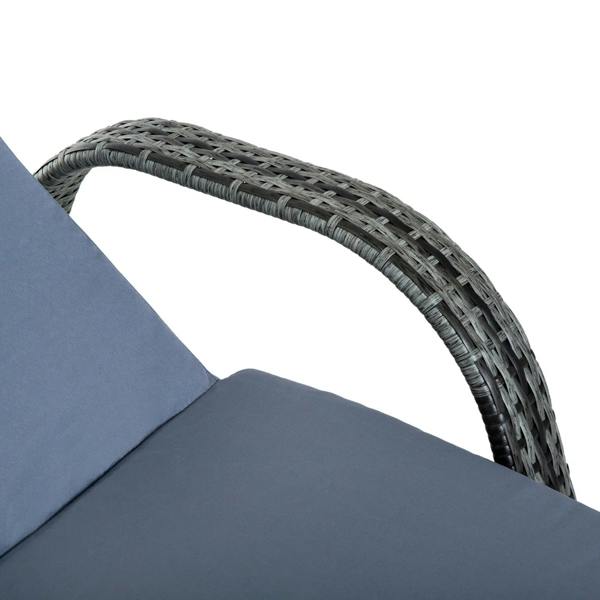 Grey rattan armrest and curved edge of sun lounger with light-blue cushion