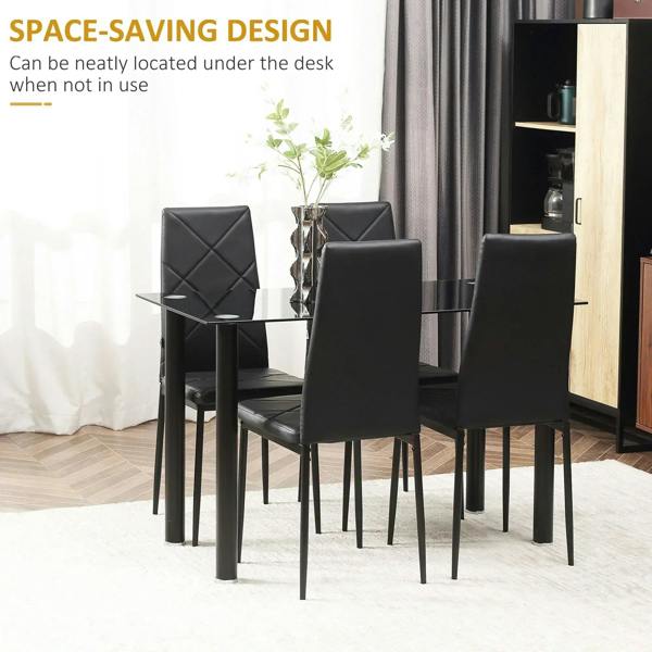 Black dining table with four quilted-back chairs arranged for space-saving seating