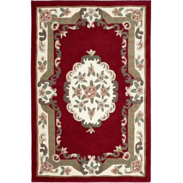 Decorative rug with floral pattern on a red background