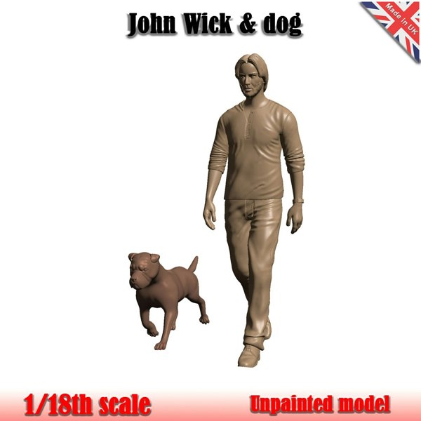 a statue of a man and a dog