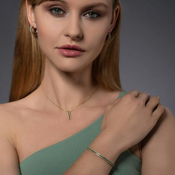 Gold Cuff Bangle Bracelet with Green Cubic Zirconia Stones - namana.london
