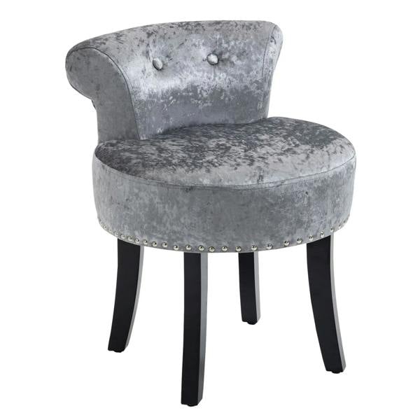 Grey velvet vanity stool with tufted backrest, studded edge, and black legs