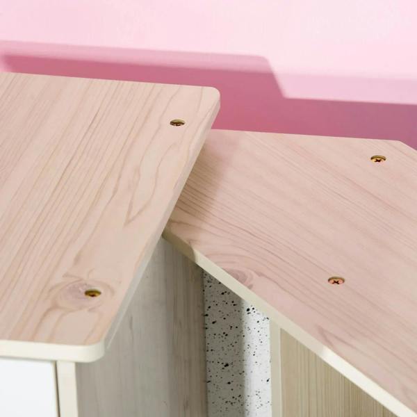 Light wood kitchen playset corner joint with visible screws