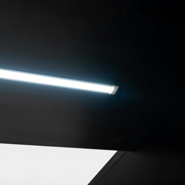 Sleek black ceiling with a modern LED light fixture, showcasing a bright, cool white glow ideal for shop displays and counters