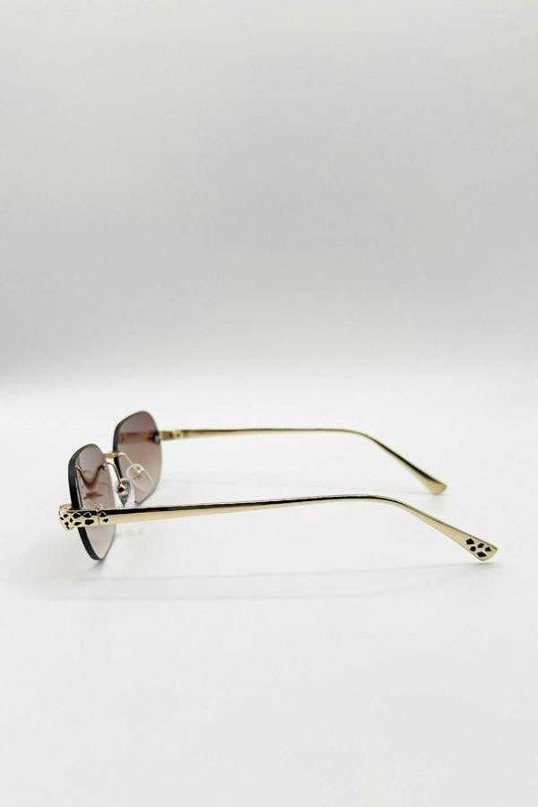 Jaguar Detail Rimless Sunglasses In Brown - svnx