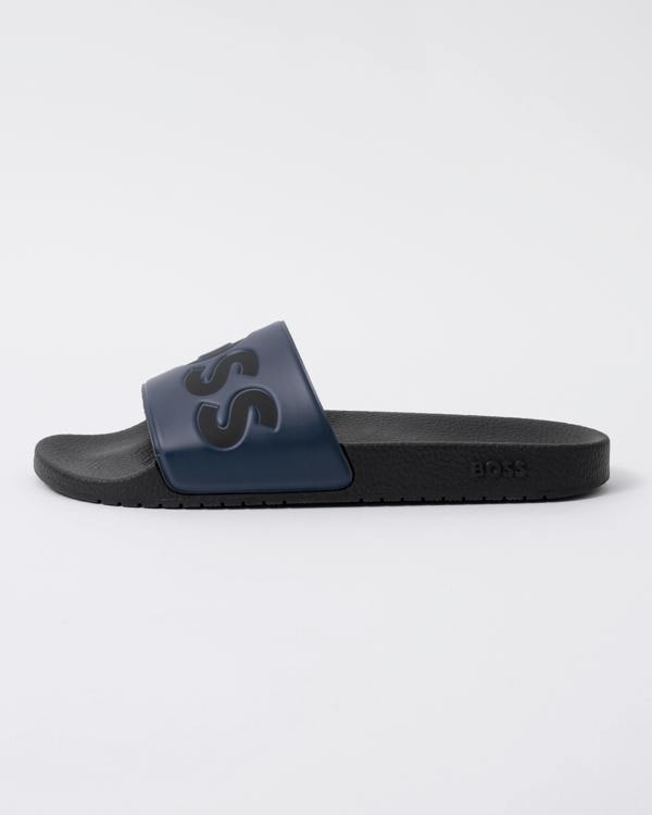 side view of BOSS Orange Aryeh Mens Italian-Made Slides With Large Logo Detail in Dark Blue 406