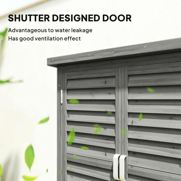 Grey wooden shed door with louvered shutter panels and white metal handle
