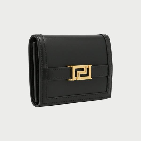 Supplied Fashion black calf leather bifold wallet featuring a gold-tone Greca motif hardware detail.