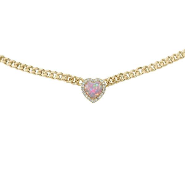 Gold necklace with a heart-shaped pink gemstone on a white background