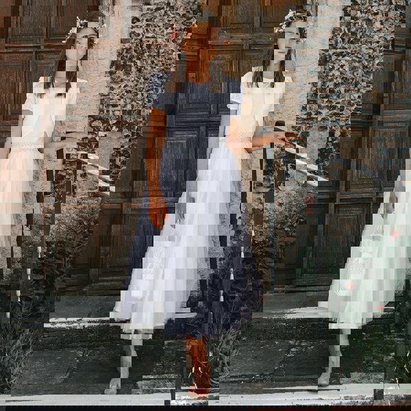 Flower girl wearing the Harper Dress