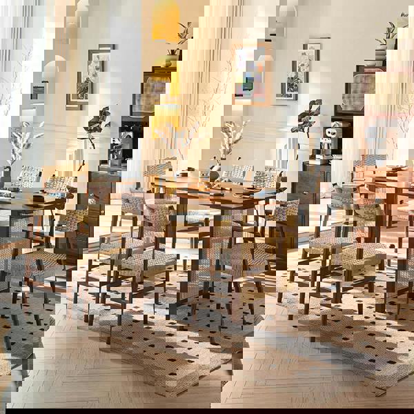 Detail view of Fuchs Dining Table, Solid Wood & Rattan, Dark Oak with small glass dining table