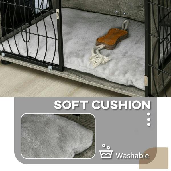 Interior view of grey plush cushion in black wire dog crate end table