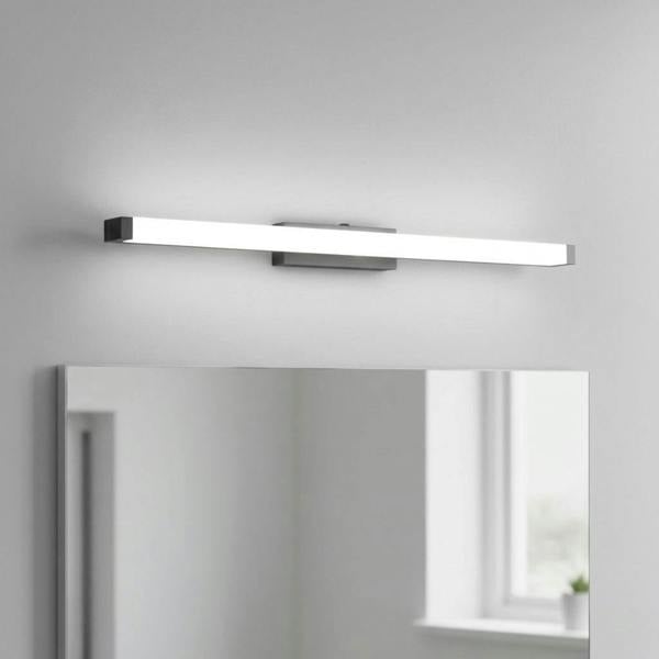 black modern bathroom light above mirror mounted in a modern bathroom on the wall 