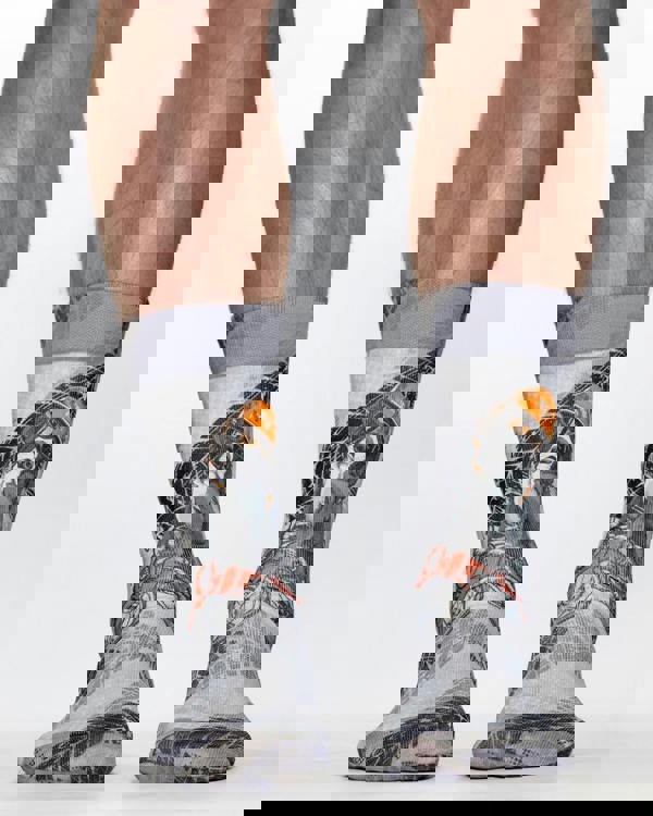 Gray socks with a graphic design of a dog and text on a white background