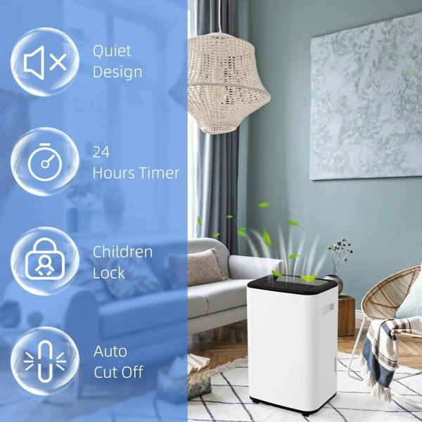 White portable dehumidifier in living room setting next to sofa and curtain