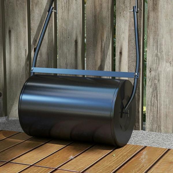 Black lawn roller with wide round drum and metal push frame on wood steps