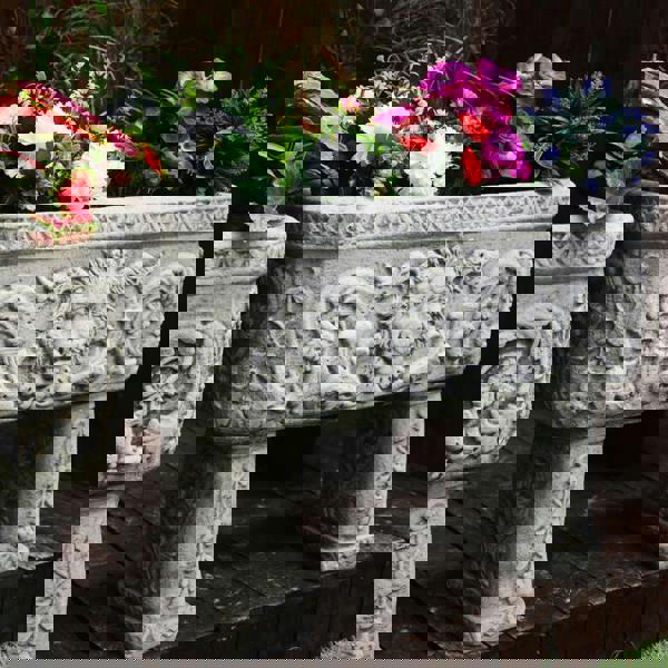 Pair of Lion design Stone Troughs on legs