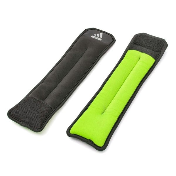 Black and green 0.5kg ankle/wrist weights with Adidas logo on a white background