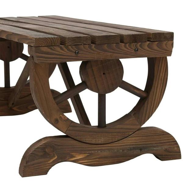 Close-up of brown slatted bench top with wheel-shaped leg frame and screws