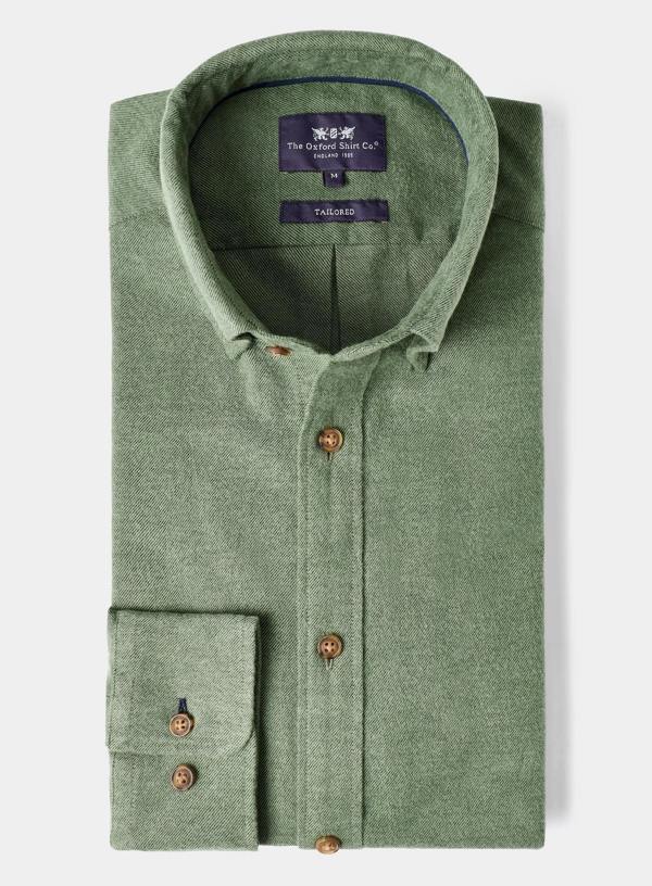 Green shirt with brown buttons on a white background