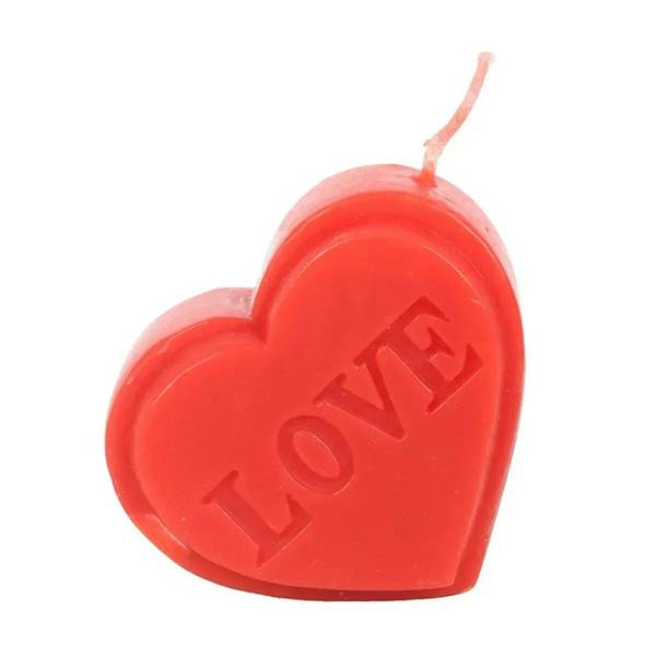 Red heart candle with LOVE lettering and wick