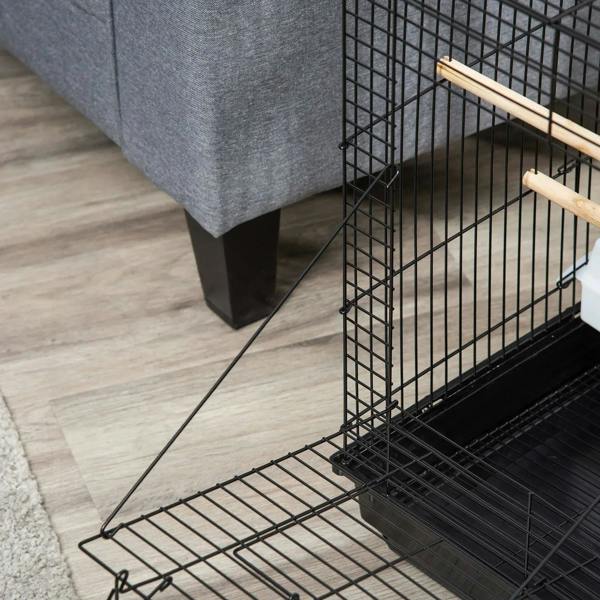 Black birdcage stand with bottom tray and wire base frame