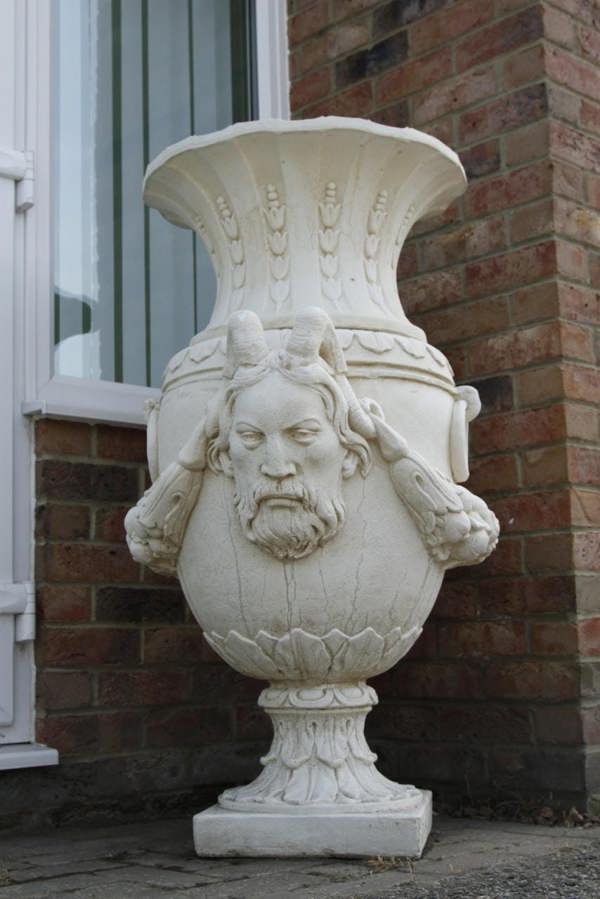 Pair of Urns With Mythical Horned Man Design