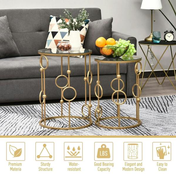 Round nesting coffee table set of 2 with gold-tone openwork metal frames and clear glass tops