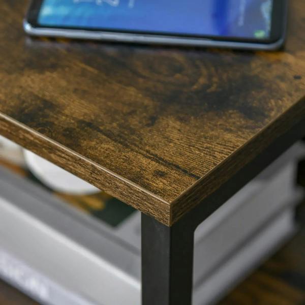 Close-up of rustic brown tabletop with dark metal frame edge