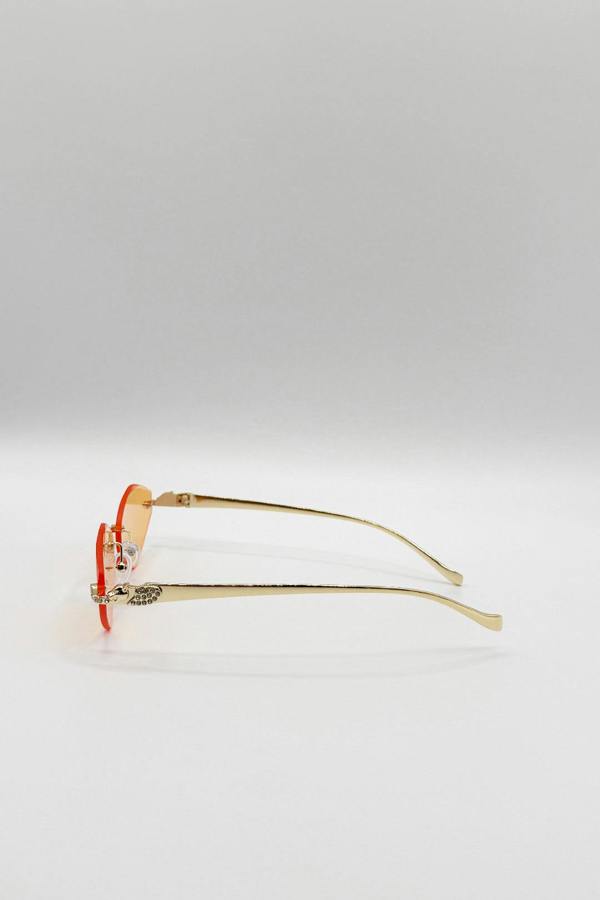 SVNX Rimless Oval Geo Metal Sunglasses in Orange