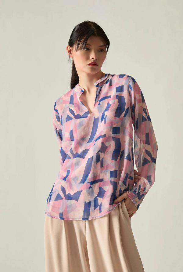 Pink mosaic print blouse angled view showing fit and sleeve detail