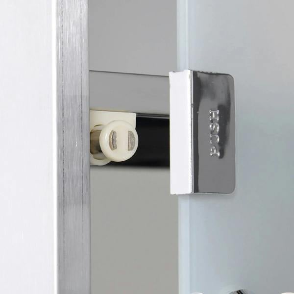 Medicine cabinet door lock detail with metal latch and key cylinder