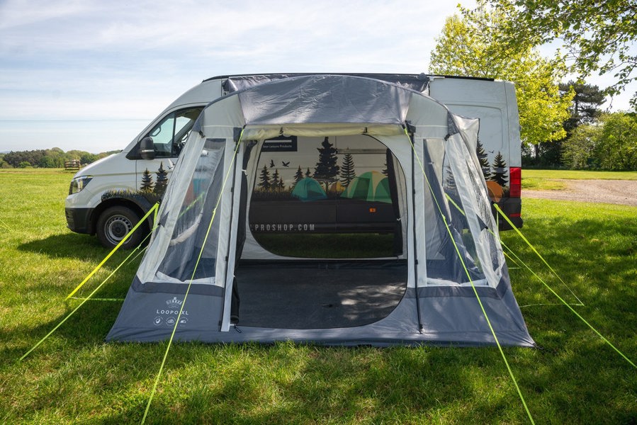 The Loopo Breeze® XL v2 Motorhome Awning on a Volkswagen Crafter Campervan with, the awnings front door is open, showing a spacious interior