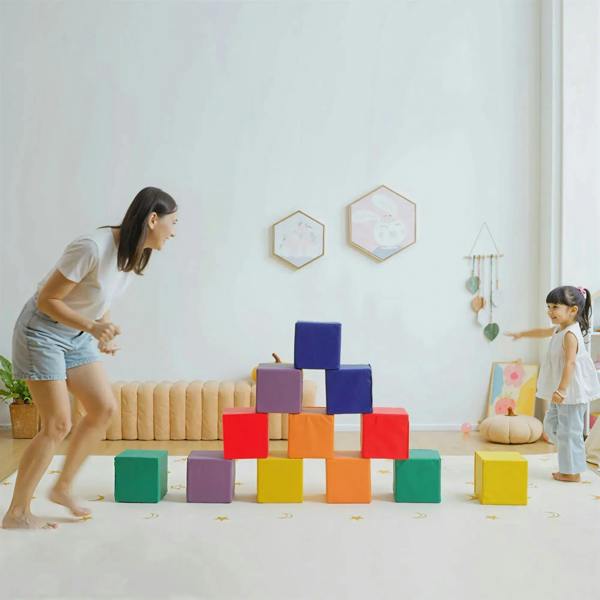 Multicolor foam cube blocks arranged in low steps and stacks