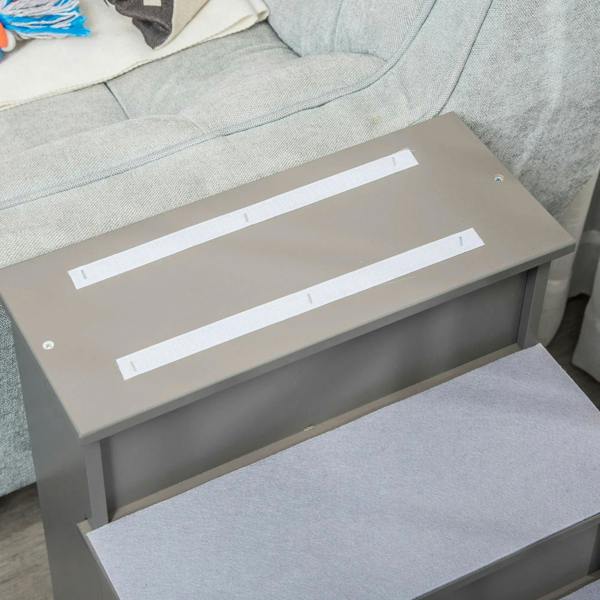 Grey pet stairs close-up showing smooth step panels and two carpet treads