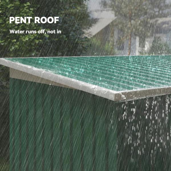 Pent roof metal shed corner with green panels and drainage protection
