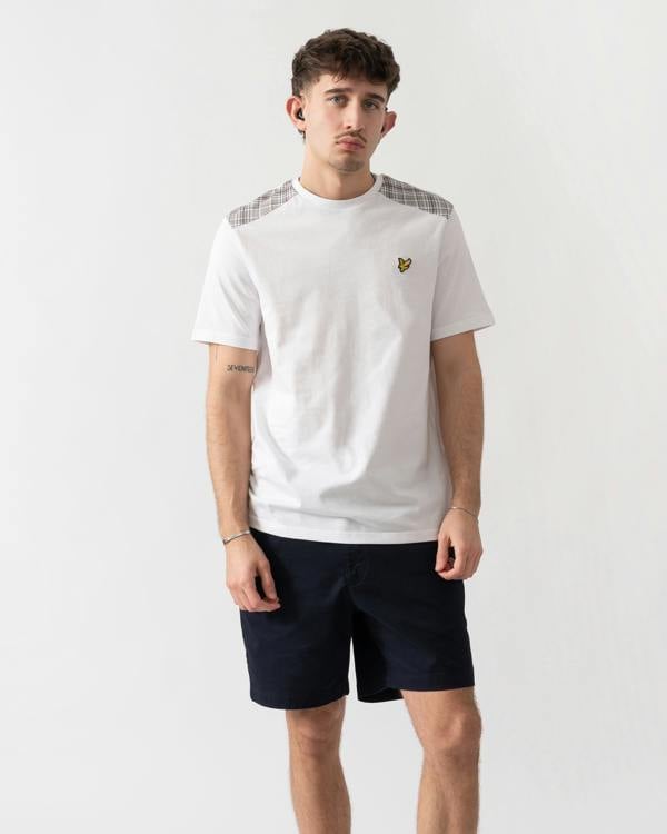 studio shot of a model wearing a Lyle & Scott Check Panelled Mens T-Shirt in 626 White