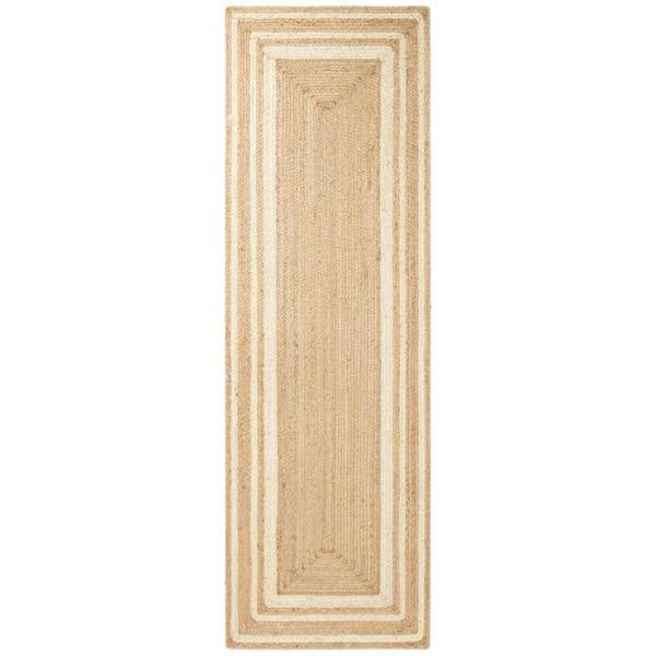 Beige braided rug on a white background