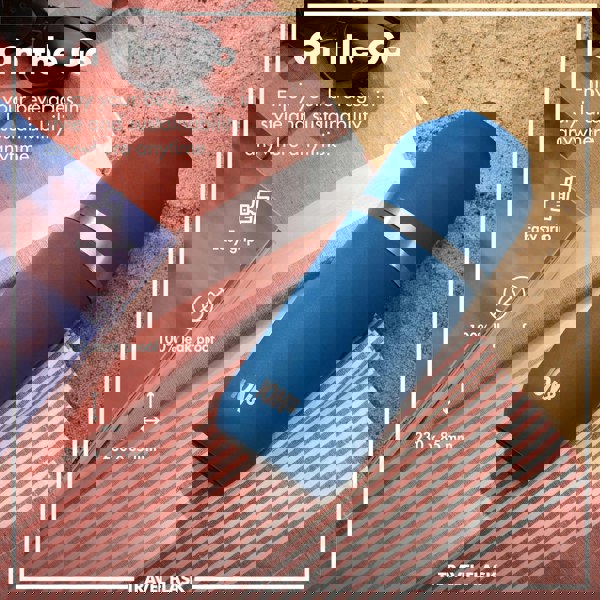 A blue travel flask labeled "ION8" rests on a striped towel beside a book and sunglasses on sand. Text reads: "On the Go Enjoy your beverages in style and sustainability anywhere anytime. Easy grip 100% leak proof 230 x 85 mm" "TRAVEL FLASK".