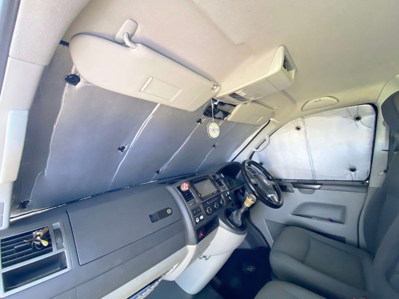 Internal image of the Blackout Insulated Blind Set in position on the windows for VW T5/T6 Campervans OLPRO