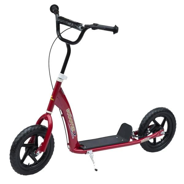 Red kids kick scooter with black handlebar, black deck, and large front and rear wheels