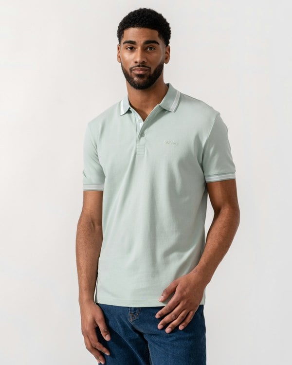 Model wearing BOSS Green Mens Paddy Cotton-Piqué Polo Shirt with Contrast Logo in Turquoise/Aqua 448 - Main