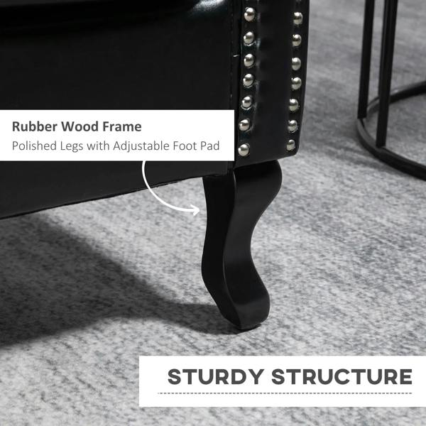 Black accent chair with rubber wood frame legs and adjustable foot pads, nailhead trim