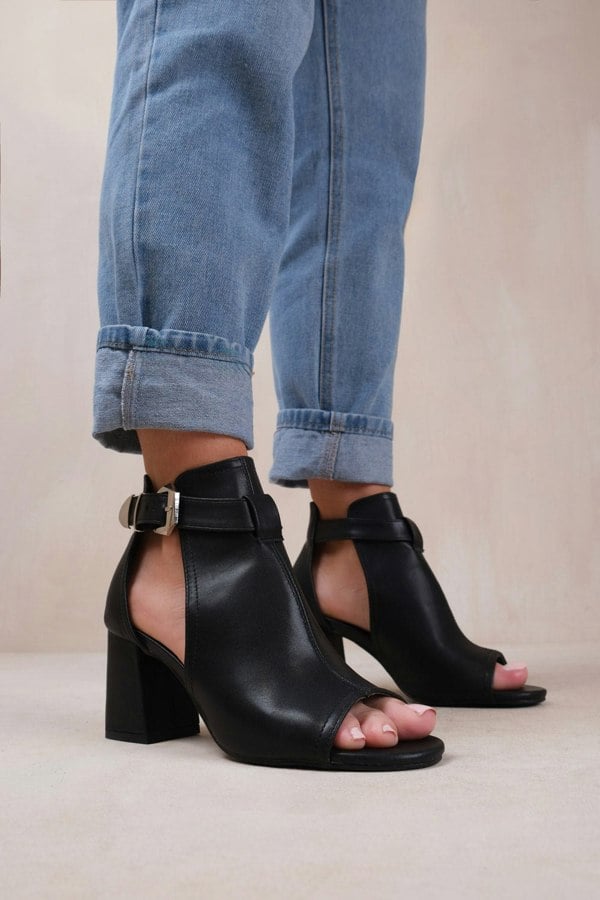 Where's That From Lisa Wide Fit Block Heel With Side Buckle and Open Toe Front in Black Faux Leather