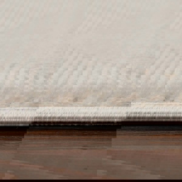 Living Room rug, cream colours, geometric, practicality in mind, the rug is anti-allergic.