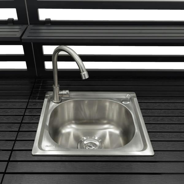 Sleek stainless steel sink with a modern faucet, set on a dark wooden countertop, ideal for outdoor kitchen setups