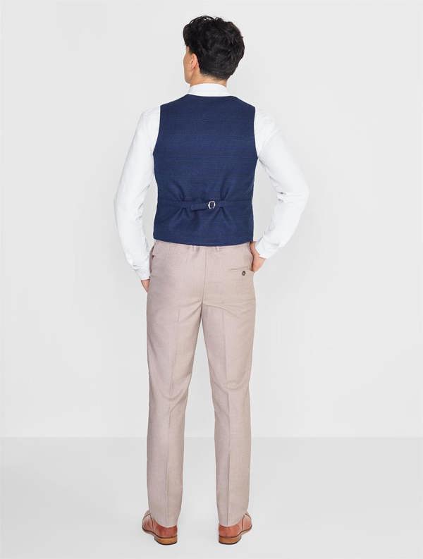 Beige and navy page boy suit