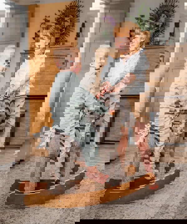 Brother and Sister playing with jasper rocking horse